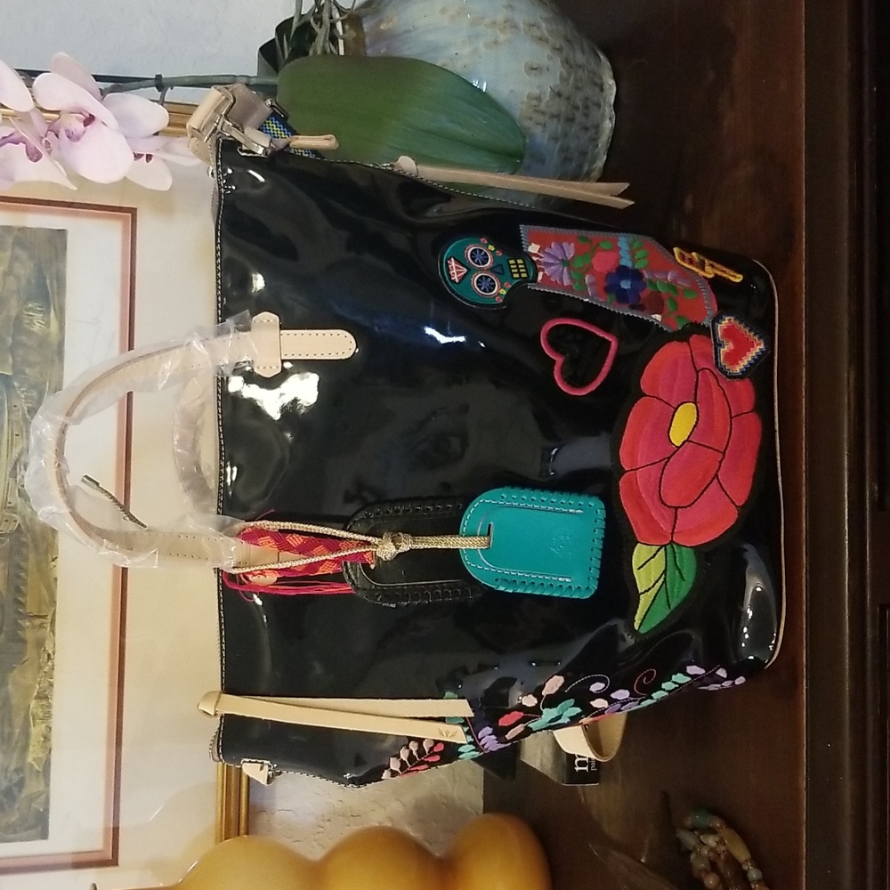 Brand new consuela poppy sling. NWT